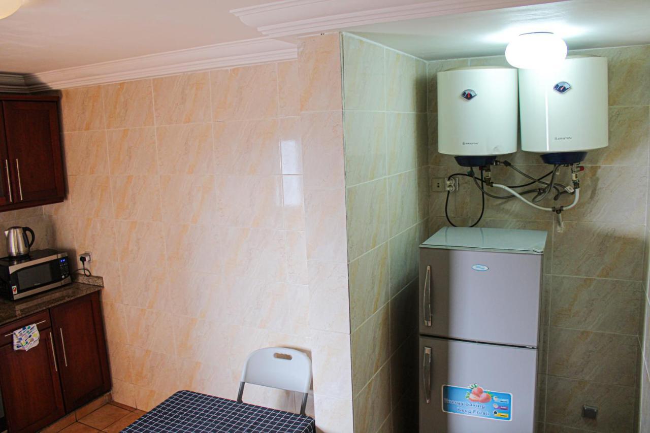 Residence Le Carat Bonapriso Douala Exterior photo